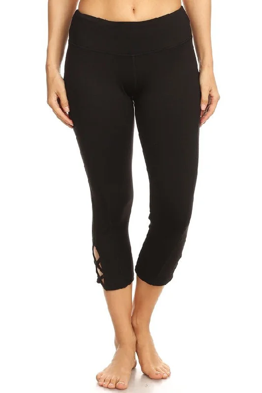 Black hi-rise legging with a side crisscross strap cutout